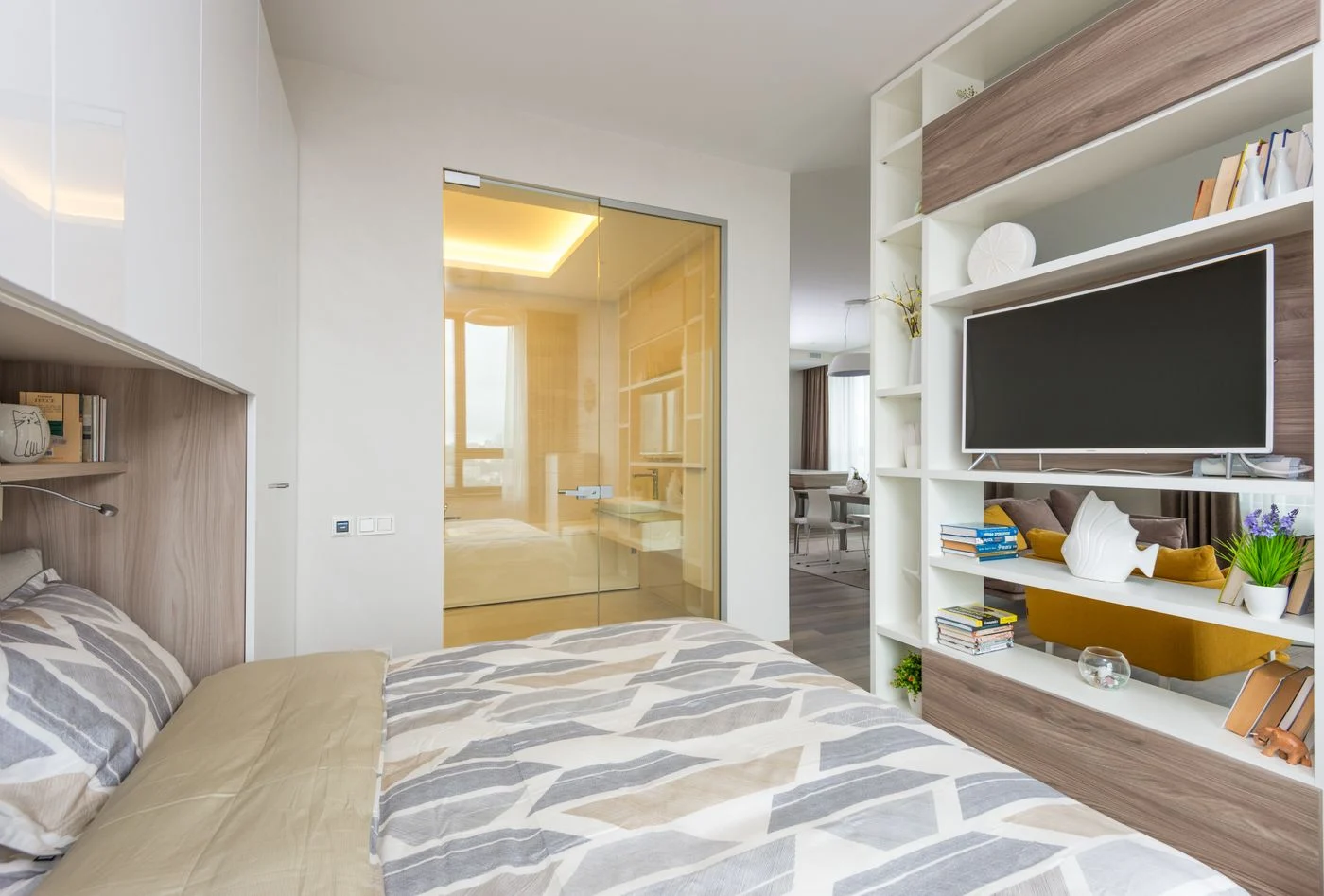 Open shelving separating living and sleeping areas