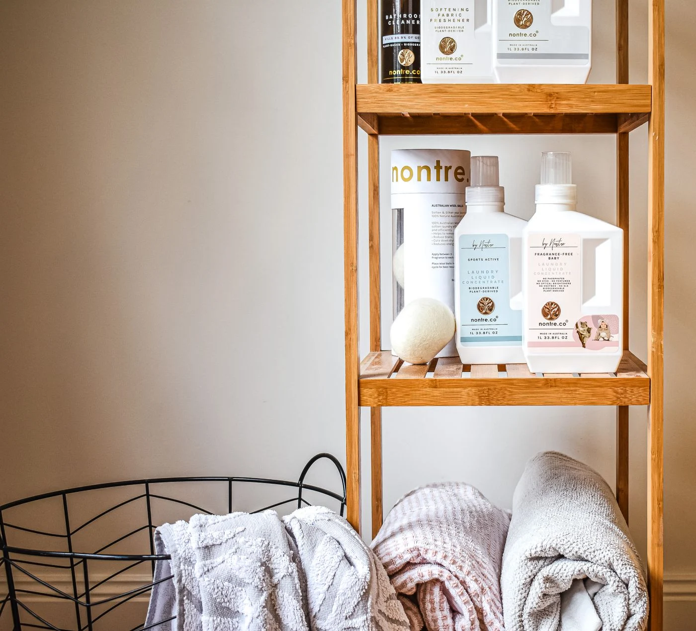 Folded towels on bathroom shelves