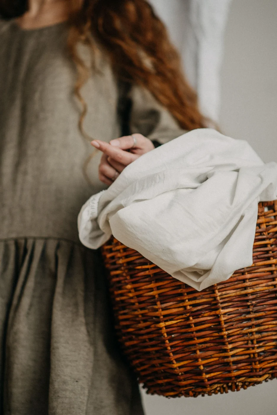 Laundry collected in a woven basket