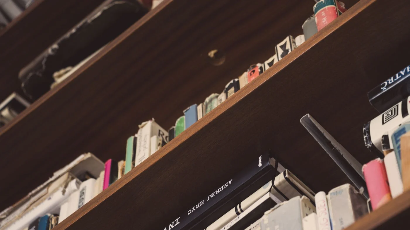 Books stored upright on home shelves