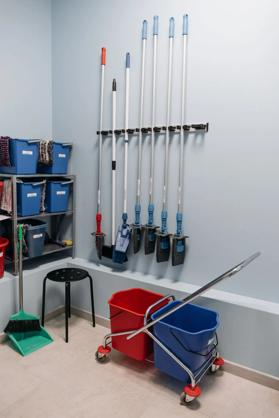 Mops and cleaning tools in a storage area