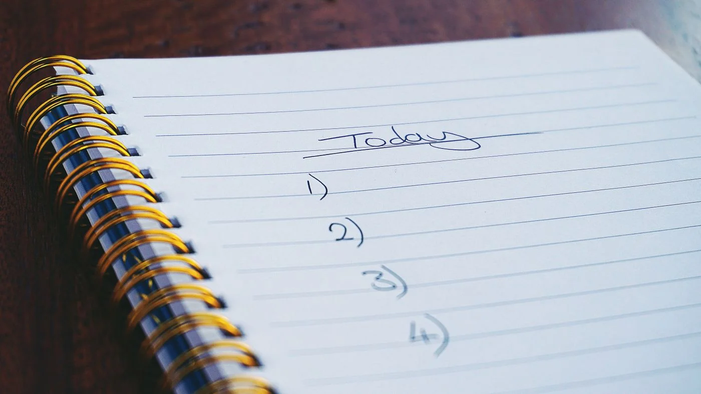 Handwritten list in a notebook
