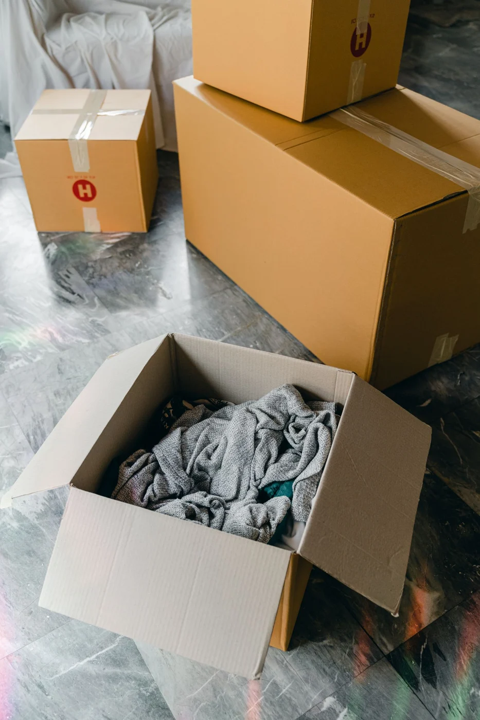 Cardboard boxes arranged on a floor