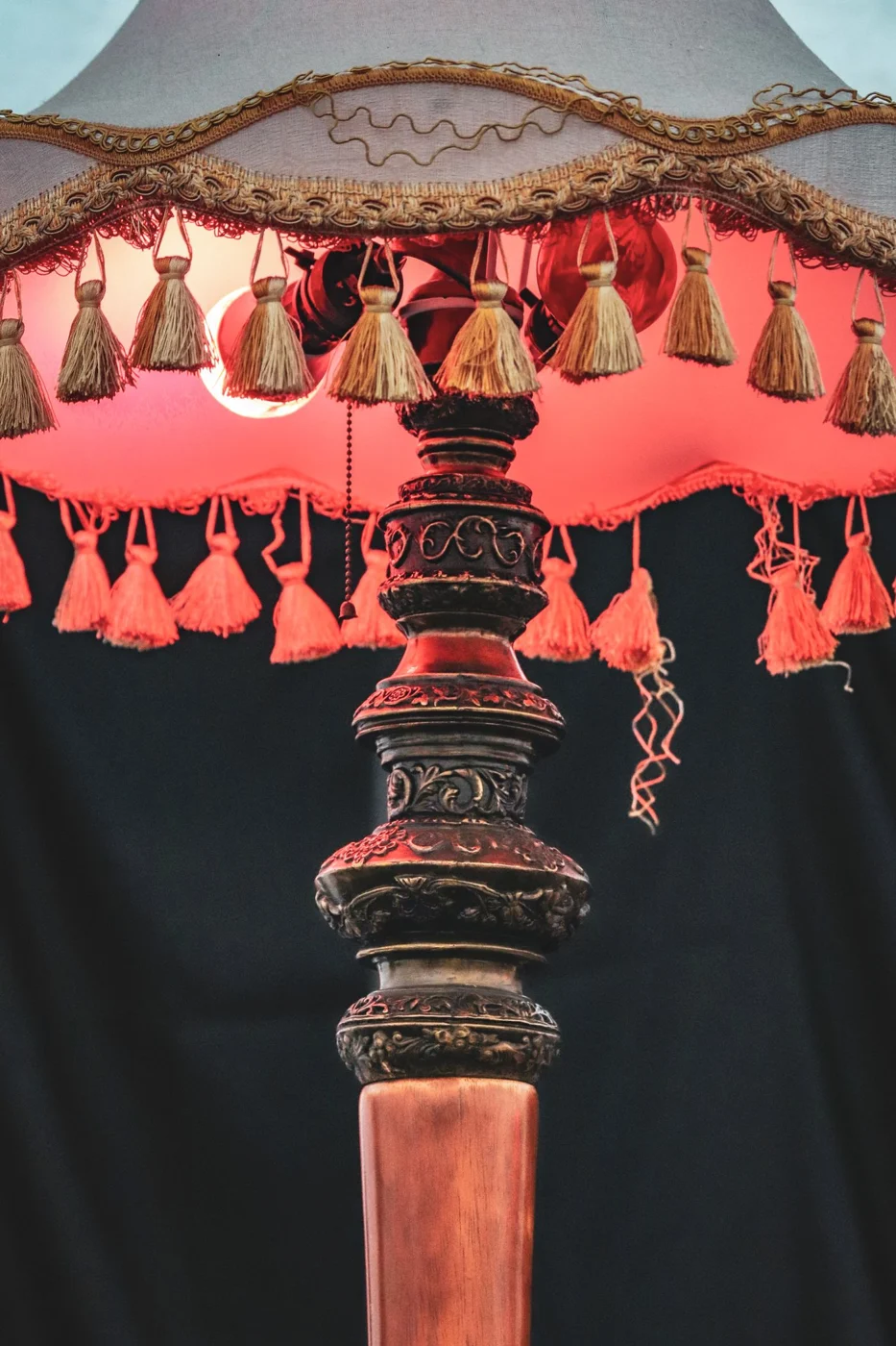 Lamp shade and light bulb seen close up