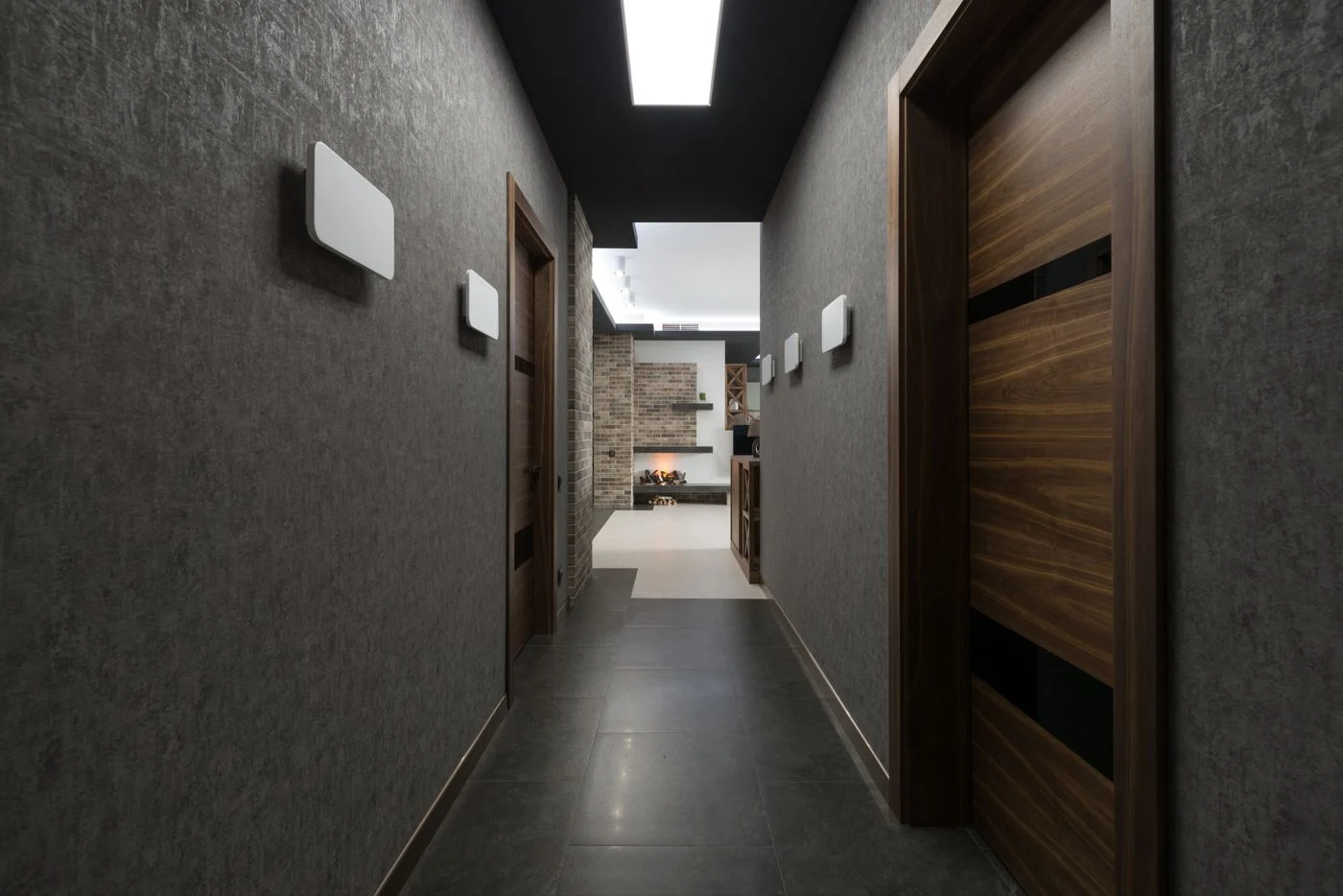 Ceiling lights along a home hallway