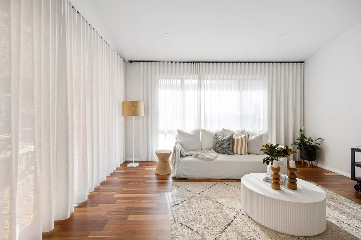 Living room with curtains and upholstered furniture