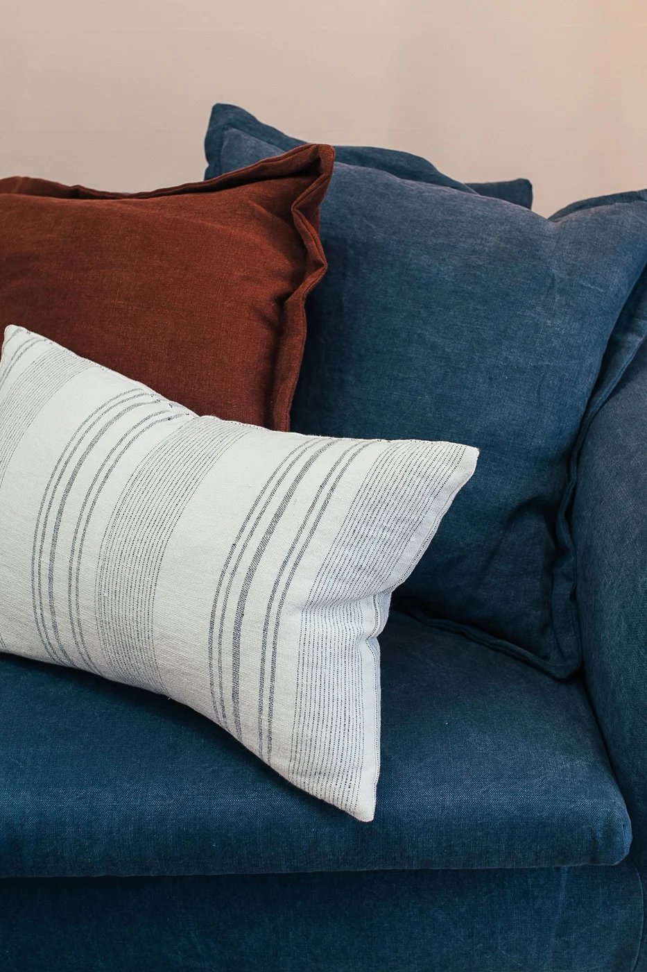Blue sofa with contrasting cushions