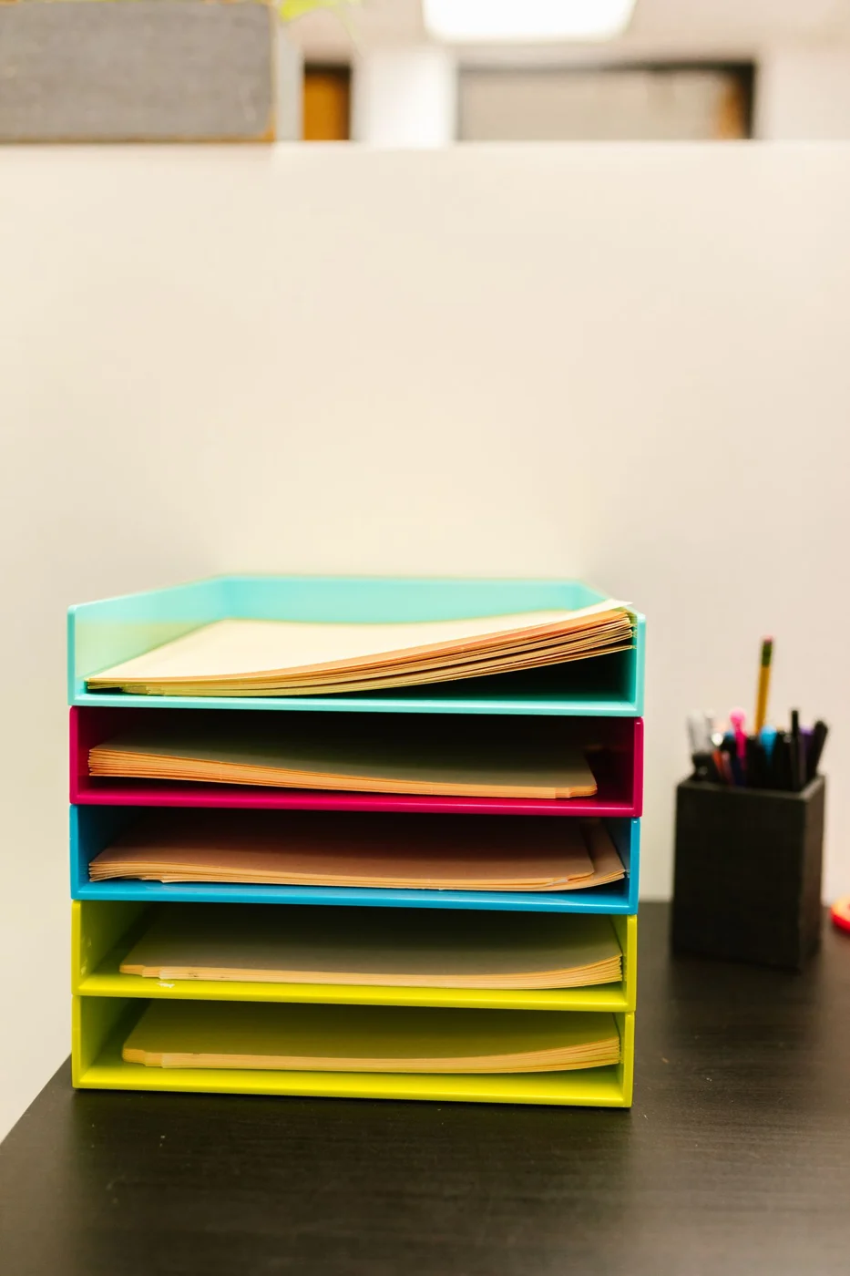 Documents stored in stacked paper trays