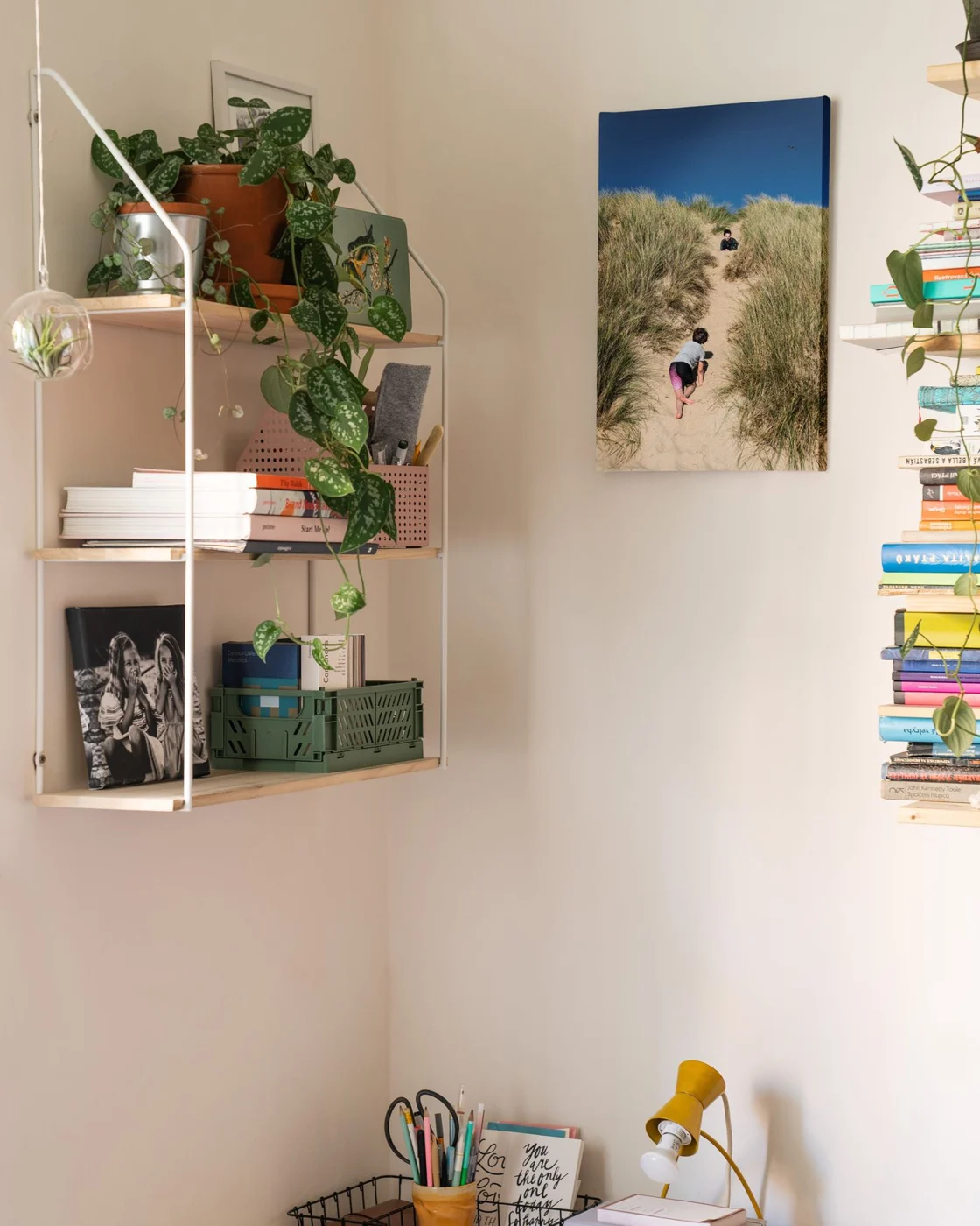 Wall shelves positioned above a desk